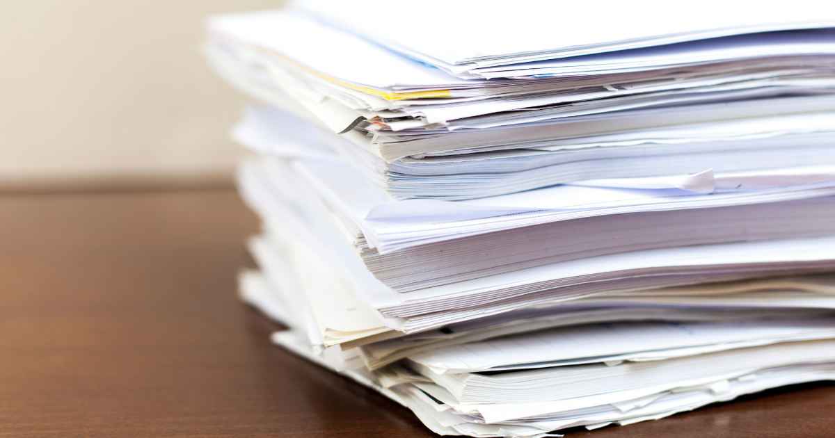 Revise and resubmit: Image of a stack of papers